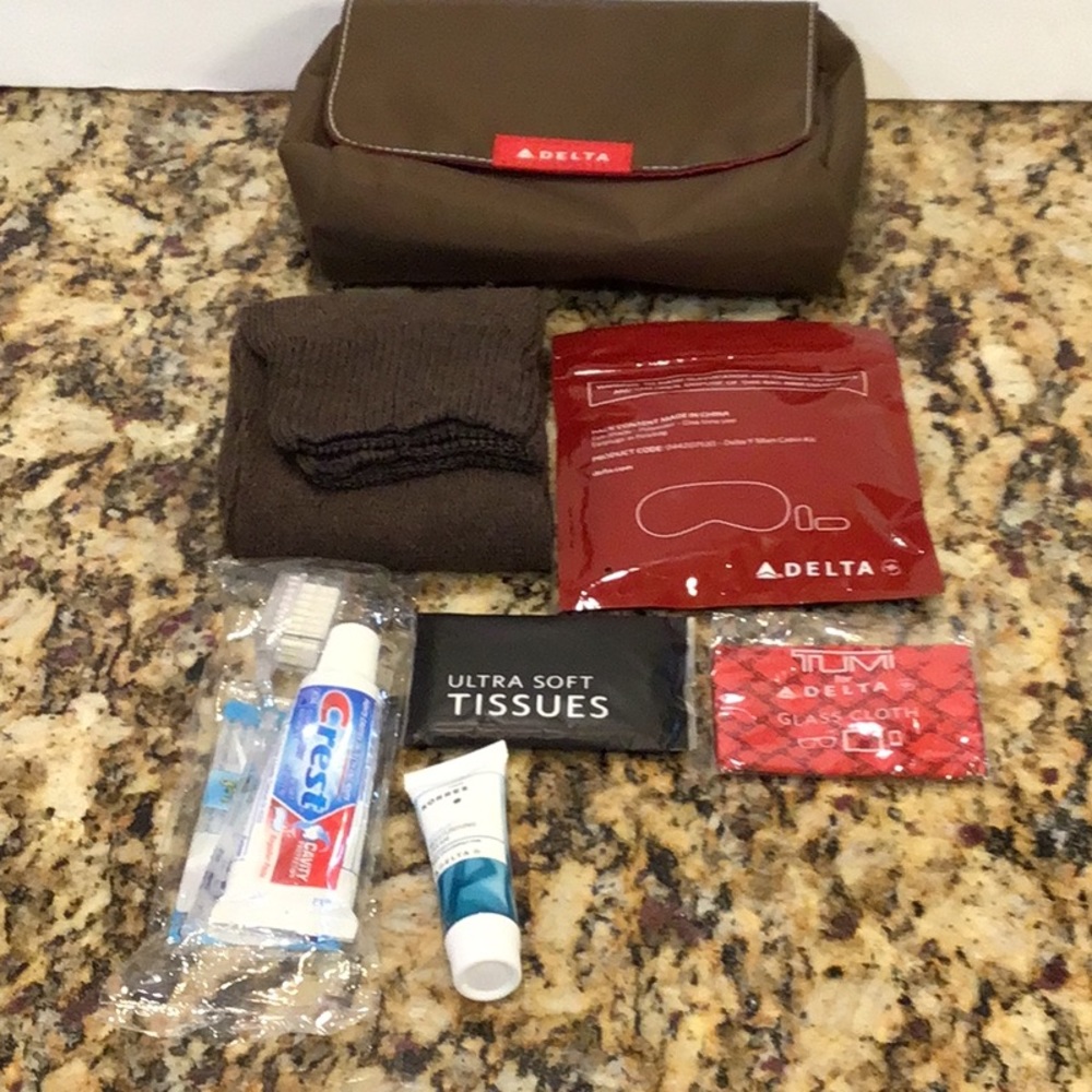 Delta dopp bag with new travel toiletries